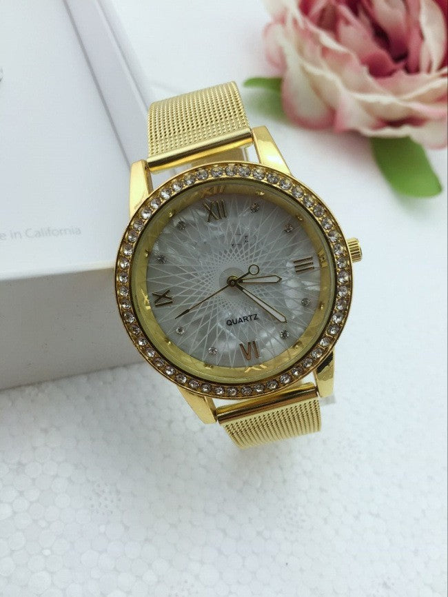 Watch female gold mesh belt