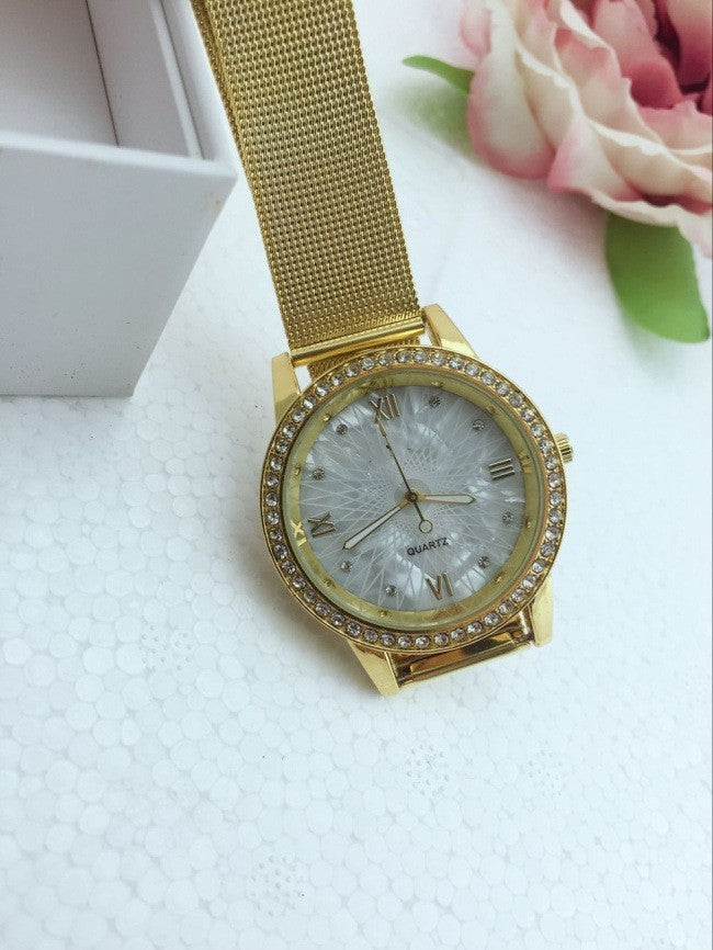 Watch female gold mesh belt