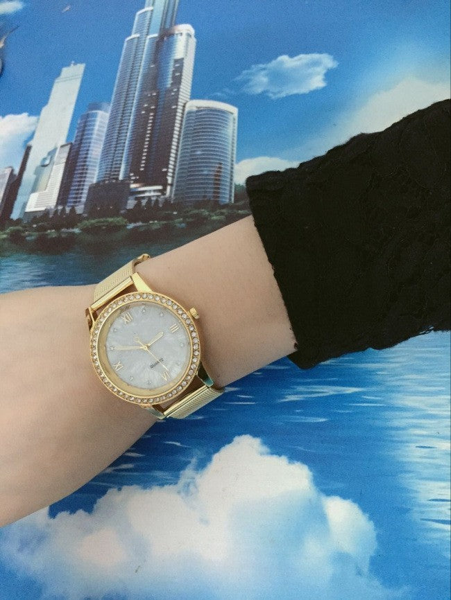 Watch female gold mesh belt